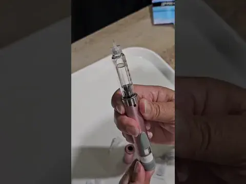 Putting together a refill pen for medications